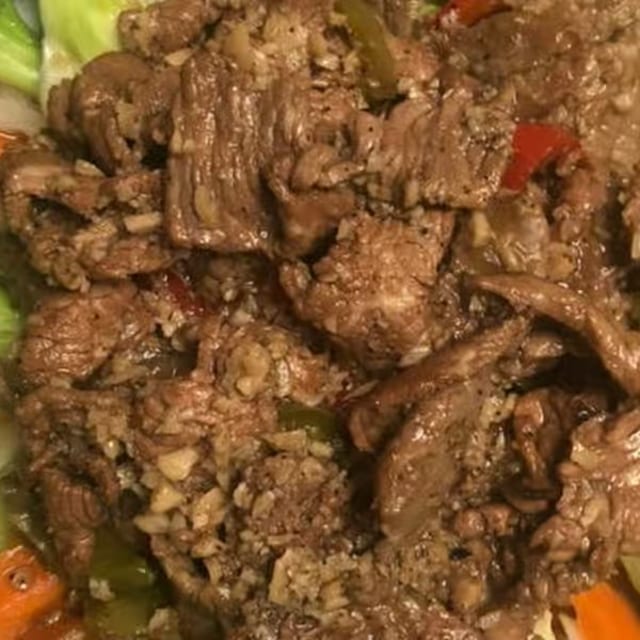 P9. *Pad Kra Tuim (Spicy Garlic).